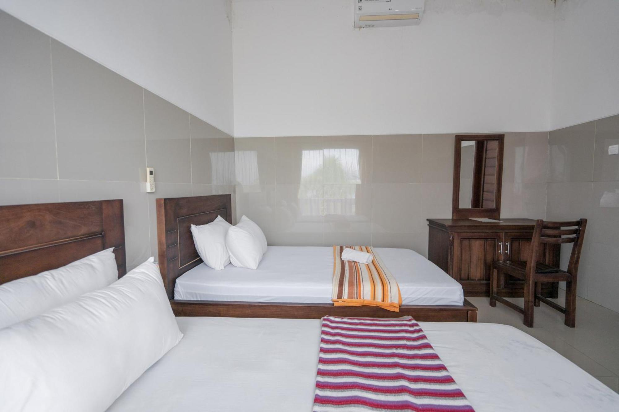 Rommeo Inn Lovina Mitra Reddoorz Temukus Exterior photo